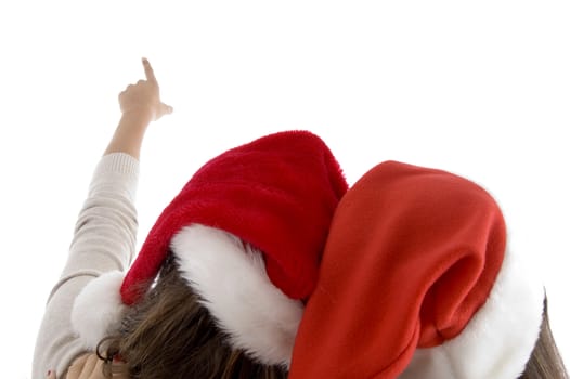 female heads wearing christmas hats against white background