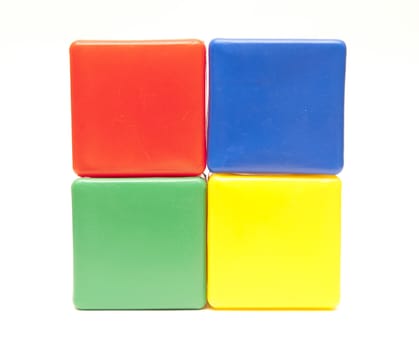 colored childrens cubes on a white background