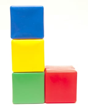 colored childrens cubes on a white background