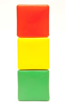 colored childrens cubes on a white background