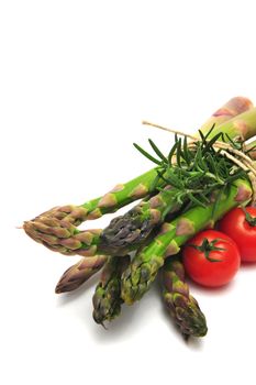 Asparagus spears with thyme and cherry tomatoes
