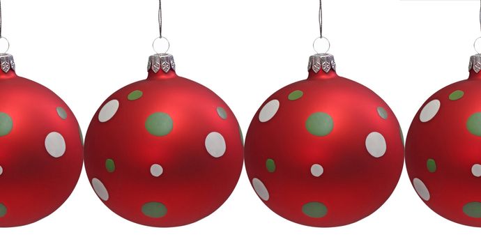 Red christmas tree balls with spots, isolated on white
