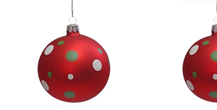 Red christmas tree balls with spots, isolated on white background