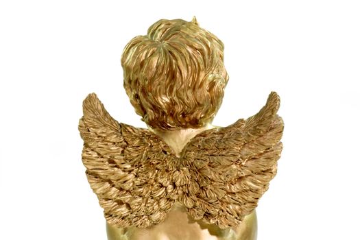 Backside of an angel figurine on bright background