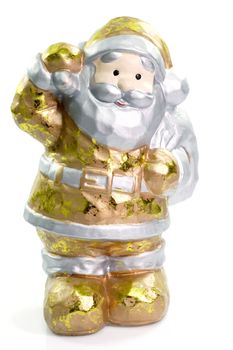 Close up of a santa figurine on bright background