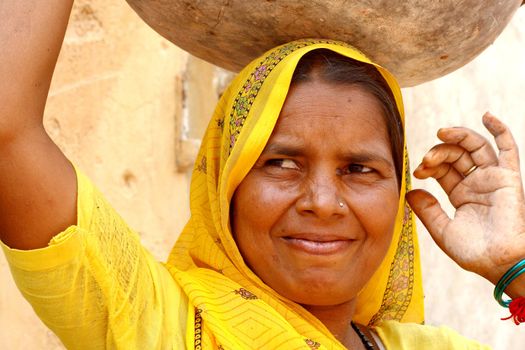 Woman wearing a yellow sari