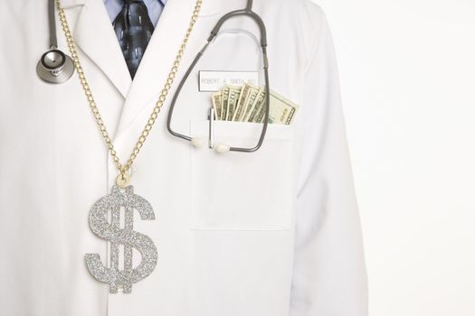 Caucasian mid adult male physician with dollar sign necklace and cash hanging out of pocket.