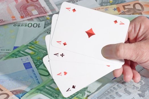 Four aces in a hand on euro notes