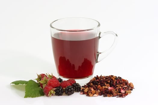 
Fruit Tea with fresh raspberry on birght background
