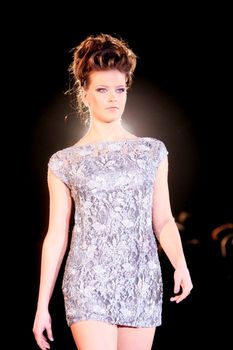 KYIV, UKRAINE - FEBRUARY 29: A model walks the runway demonstrating an outfit by Iryna Chernyak during the Trade Mark Defile on February 29, 2008 in Kyiv, Ukraine