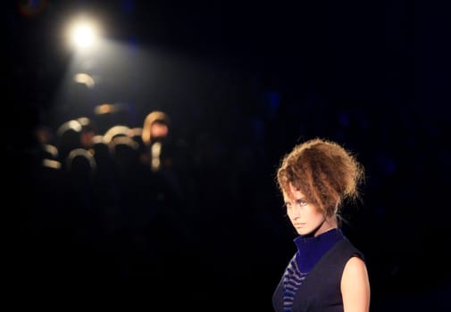 KYIV, UKRAINE - MARCH 15: A model walks the runway wearing an outfit by Oksana Karavanska of her Fall Winter 08/09 collection during the 22nd Ukrainian Fashion Week on March 15, 2008 in Kyiv, Ukraine