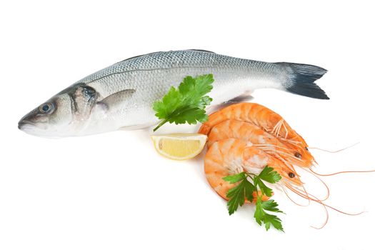 sea bass with prawns, lemon and parsley isolated on white background with clipping path