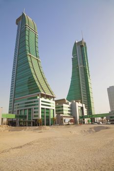 Image of the Financial Harbour towers in the desert, Manama, Bahrain.
