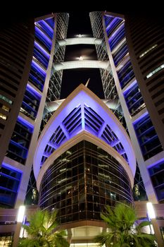 Night image of Bahrain's iconic building, the Bahrain World Trade Center, Manama, Bahrain.