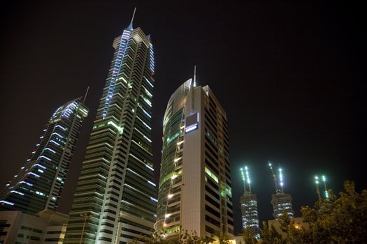 Night image of Bahrain's iconic buildings, the Bahrain Financial Harbour, Manama, Bahrain.