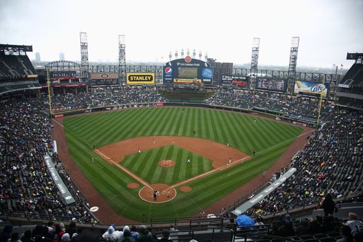 White Sox baseball players during a Sunday afternoon game against the Cleveland Indians