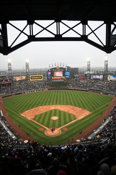 White Sox baseball players during a Sunday afternoon game against the Cleveland Indians