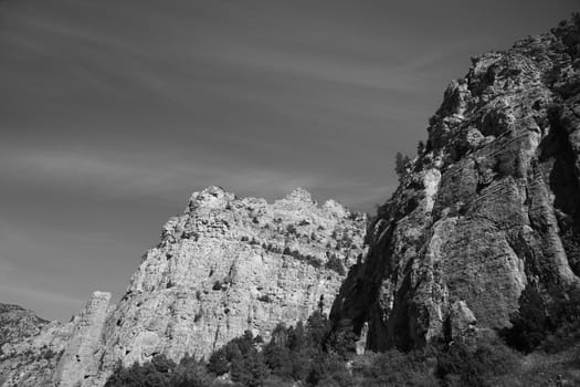 Mountains and bright sky along Wind River Scenic Byway in black and white