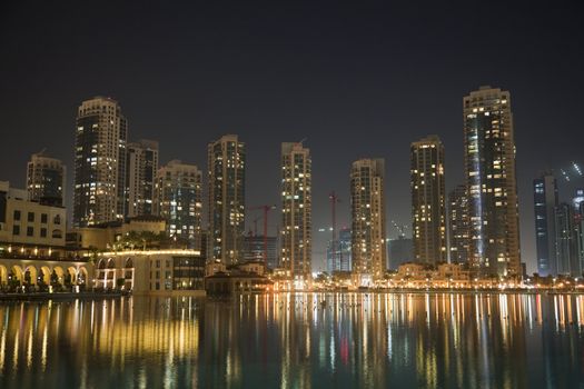 Night image of Dubai skyline, United Arab Emirates.
