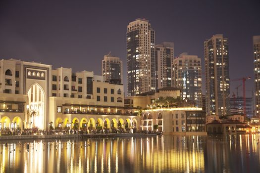 Night image of Dubai skyline, United Arab Emirates.
