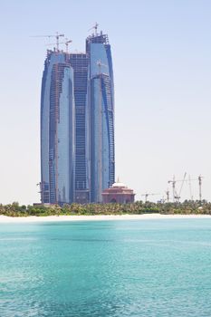 Image of a modern building under construction at Abu Dhabi, United Arab Emirates. One of the many beautiful buildings being constructed in this fast growing country.