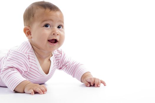 portrait of playing cute baby looking upward on an isolated background