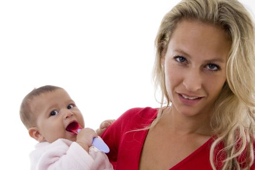 mother with her baby looking at camera on an isolated white background