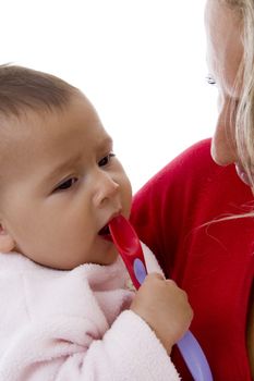 close up of mother with her baby on an isolated background