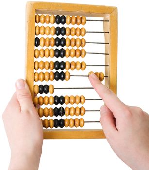 Wooden abacus in hand on the white background