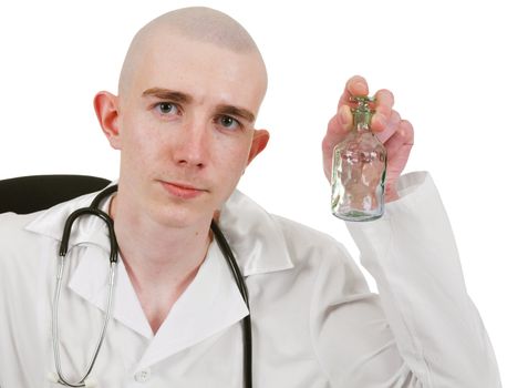 Man in doctor's smock whith bottle in hand on the white background