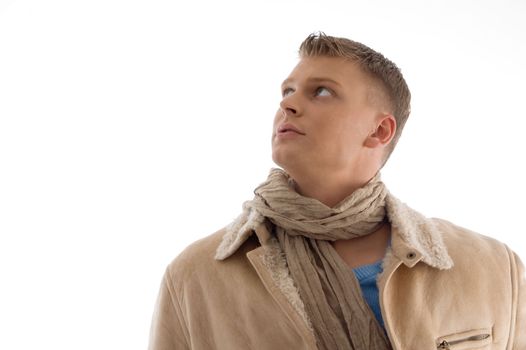 portrait of young male looking upward with white background