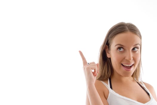 portrait of young pointing model on an isolated white background