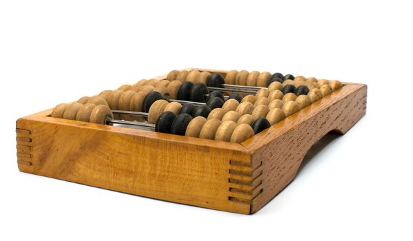 Ancient wooden abacus a close up  isolated on a white background.