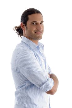 handsome young guy posing and looking at camera against white background