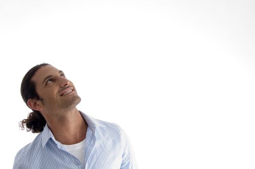 smiling guy looking upwards on an isolated white background