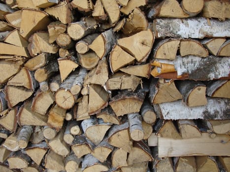 Giant stack of cut pine fire wood. 