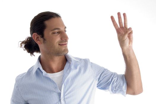 young american male with counting fingers with white background