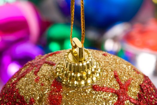 fir ball macro shot, over toys background