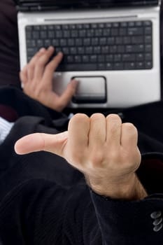 businessman gesturing thumbs up on an isolated background