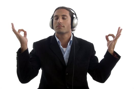 young american attorney listening music on headset against white background