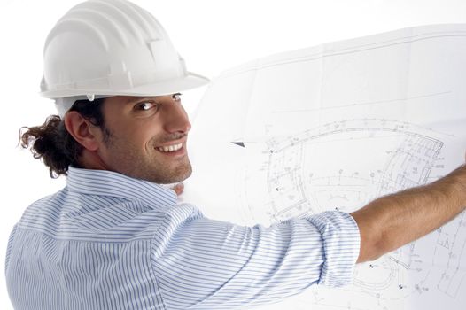 young good looking architect showing blueprints with white background