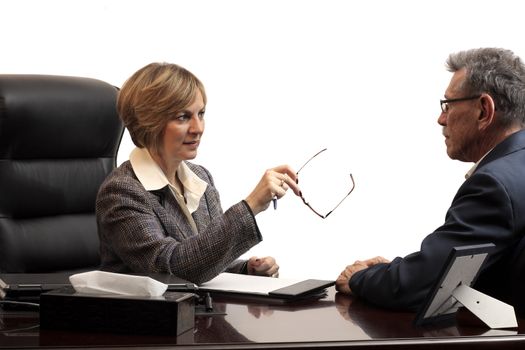 Woman executive coaching a male employee