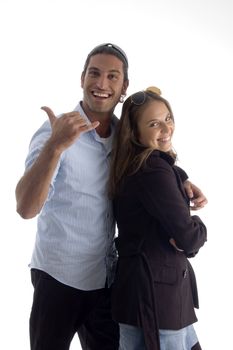 young caucasian man posing with his girlfriend on an isolated background