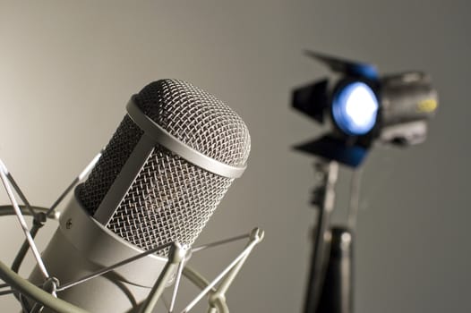 Microphone in studio on a light background.