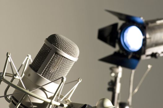 Microphone in studio on a light background.
