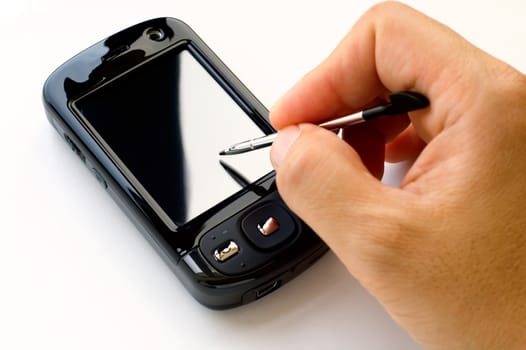 Man hand holding pda and stylus, isolated over white