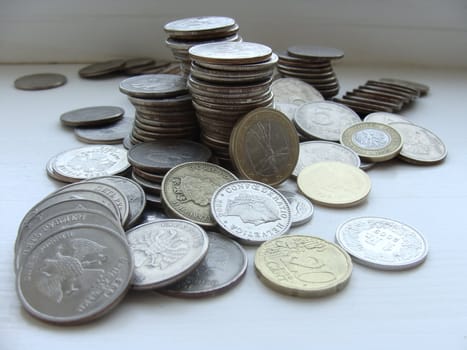 Coins of the different countries close up 