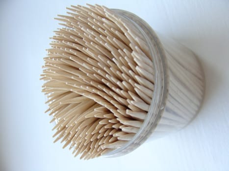 Box of wooden toothpicks close up 