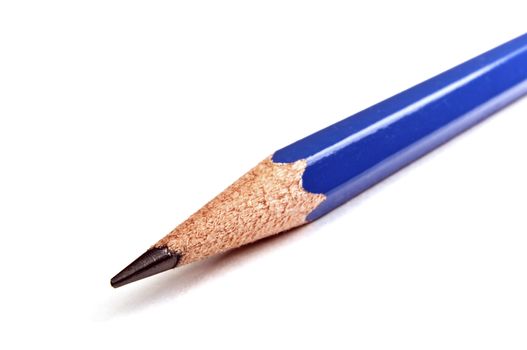 Close up of a black pencil on white background.