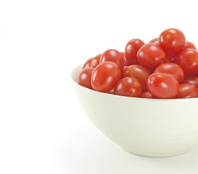 bowl of italian ripe cherry tomatoes on white background